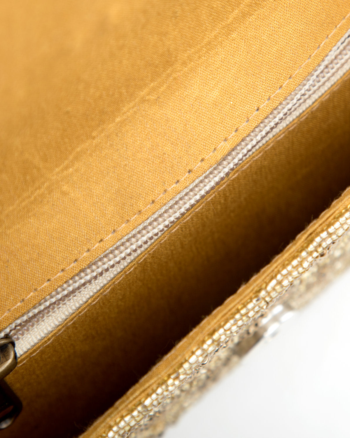 Gold Embroidered Handbag by CERENA Paris — angled view