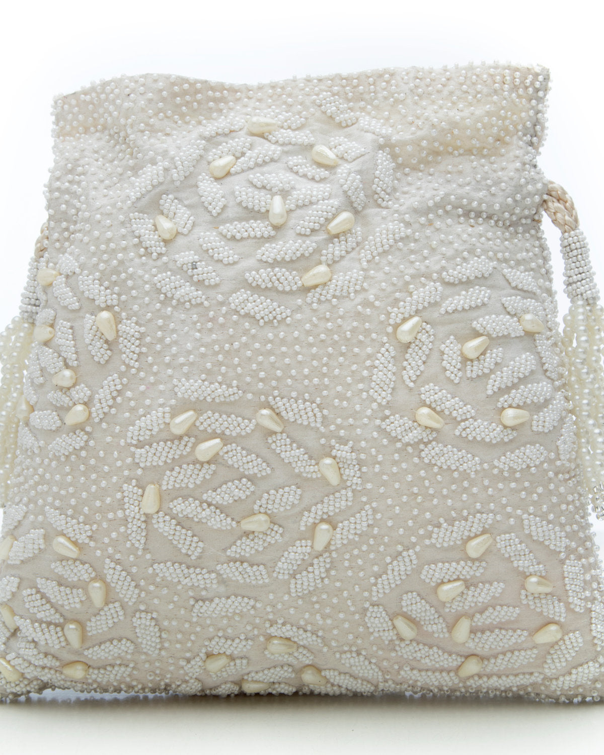 White Embroidered Handbag by CERENA Paris — front view