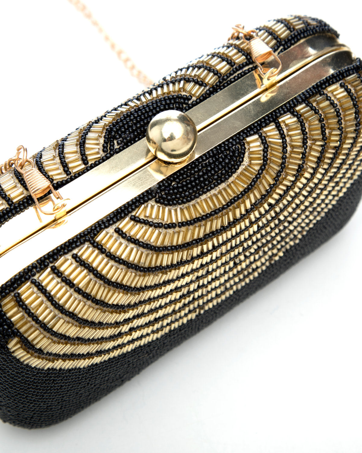 Black Gold Embroidered Evening Clutch by CERENA Paris — styled